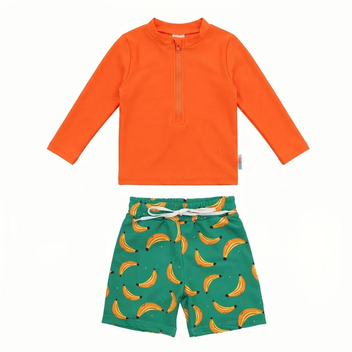 Boys' sun-protective rash guard and swim trunks, a complete swimwear outfit for beach vacations and pool days.