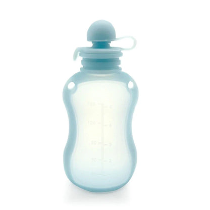 Silicone baby food pouch with secure lid, ensuring leak-proof milk transport