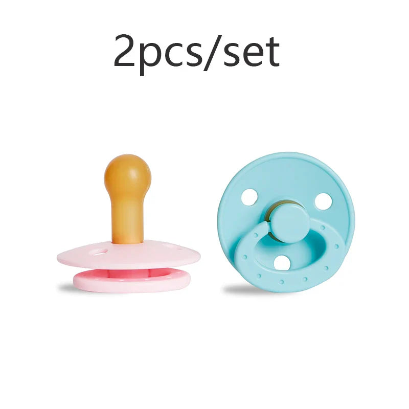 Set of two infant comfort pacifiers, BPA-free, pink and cream, natural rubber feel