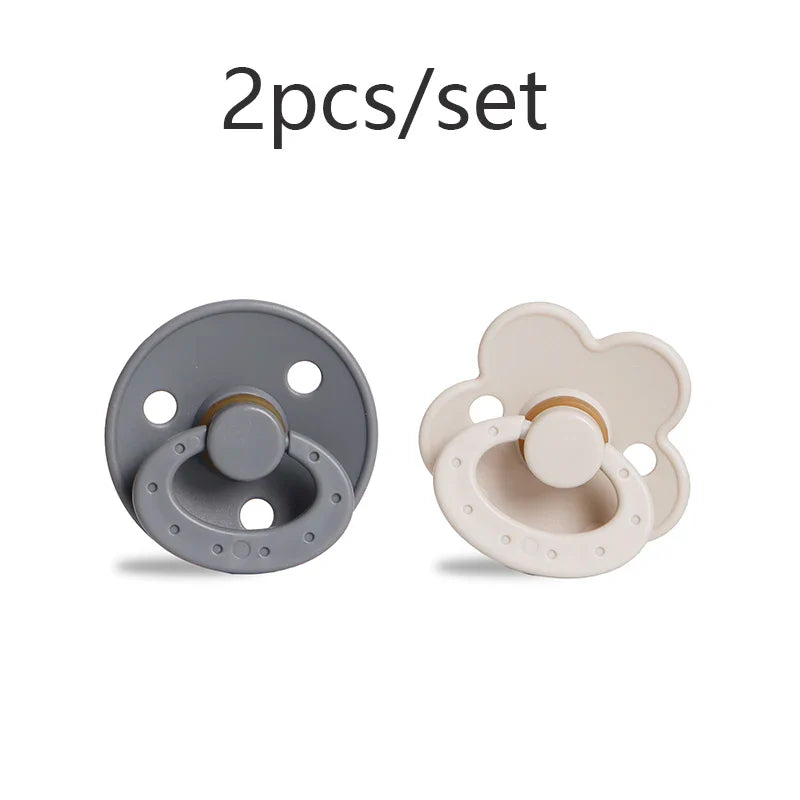 Stylish baby accessory: BPA-free pacifier, modern arch design, dusty rose