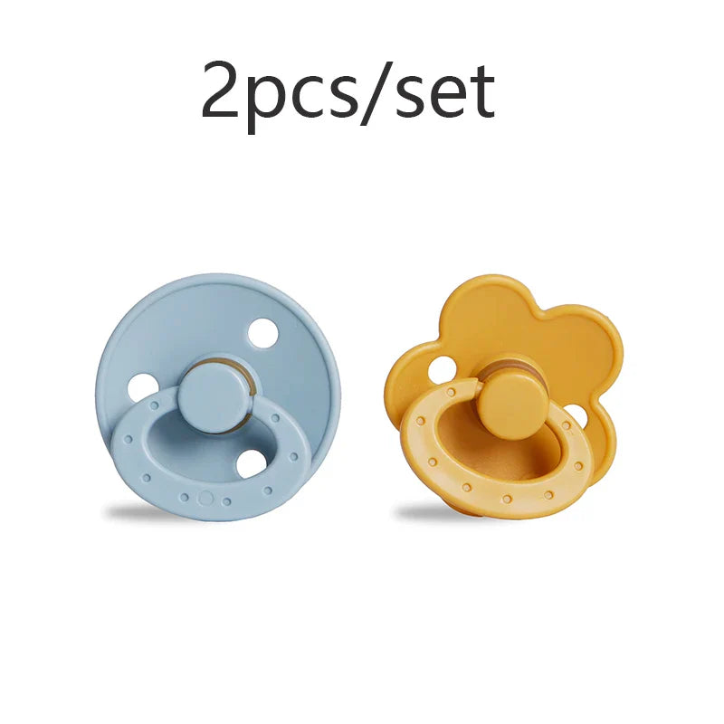 Two-tone BPA-free silicone pacifier, gray and yellow, comforting newborn essential