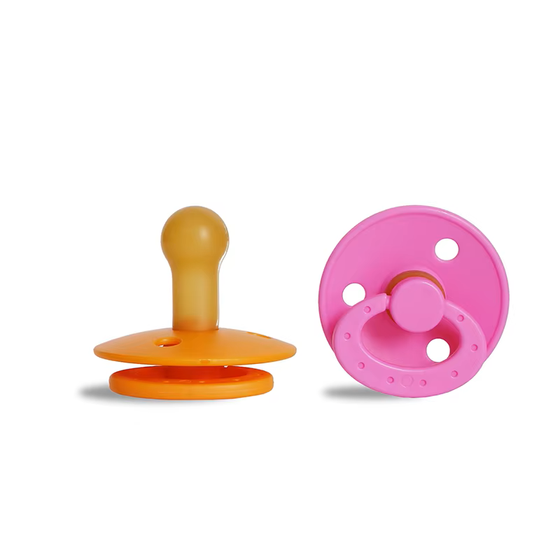 Baby accessory: BPA-free silicone pacifier, round shield, soft orange hue