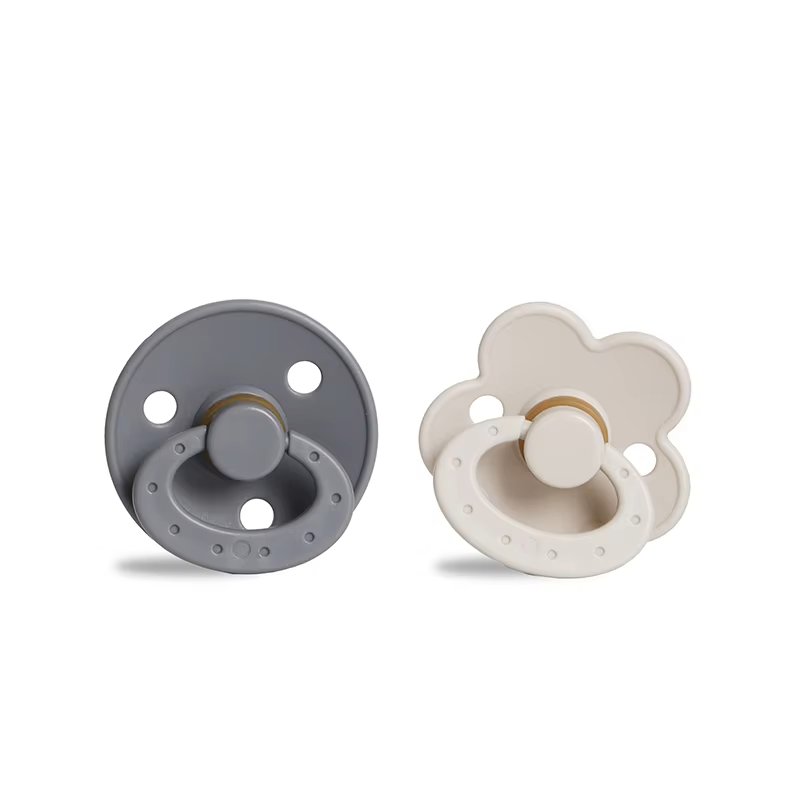 Stylish Scandinavian baby pacifier, silicone, subtle earth tones, reliable comfort