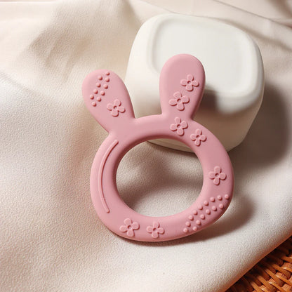 Playful carrot bunny silicone teether, a must-have BPA-free infant toy that offers effective teething relief