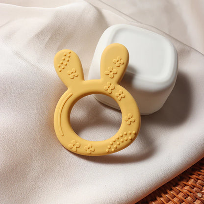 Ergonomically designed carrot bunny silicone teether, a safe BPA-free infant toy for easy gripping and chewing