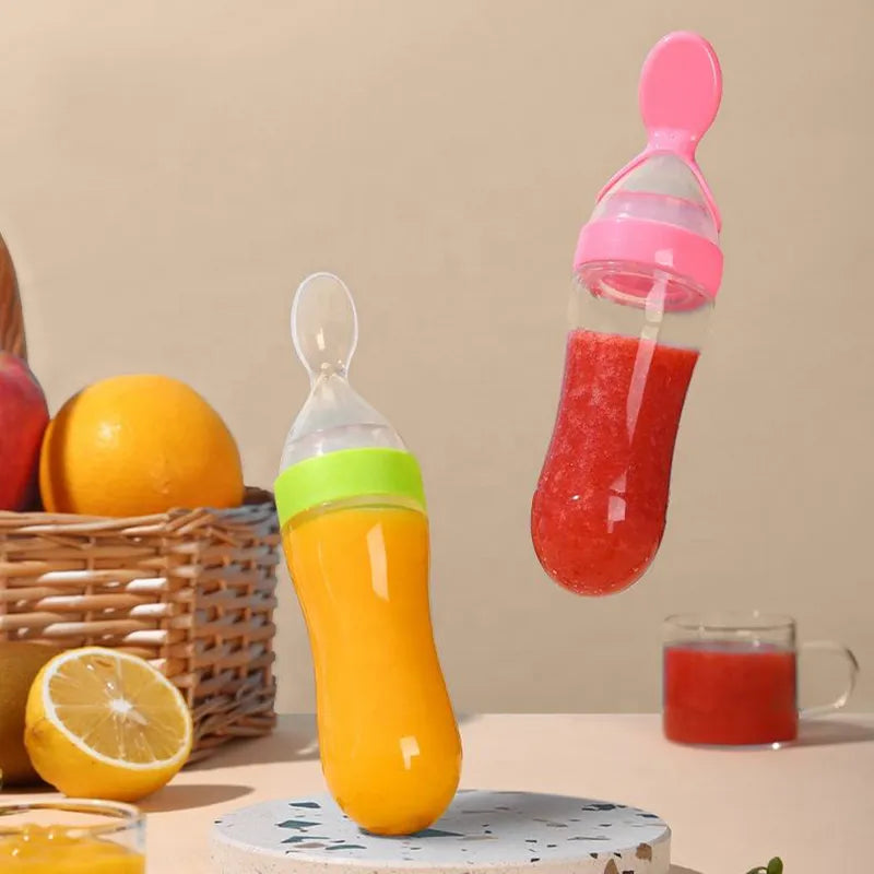 BPA-free silicone baby training spoon and squeeze feeder bottle for infant solid food introduction