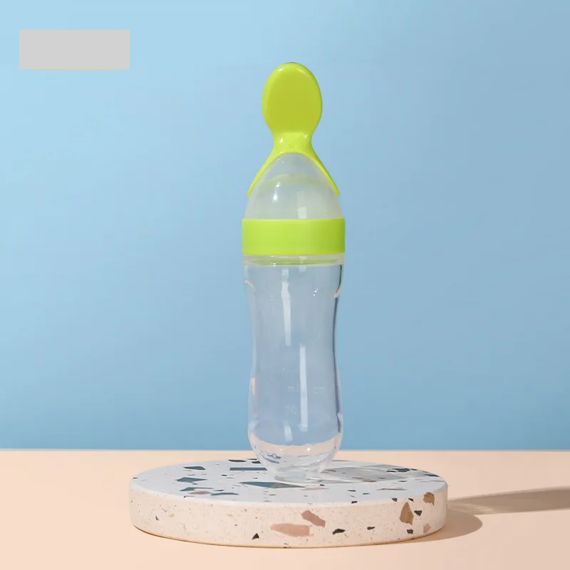 Safe and easy-to-use baby feeder bottle with a silicone spoon for mess-free meal times