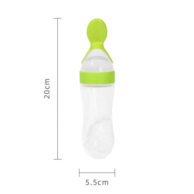 Ergonomic squeeze feeder bottle with integrated silicone spoon for easy baby meal dispensing