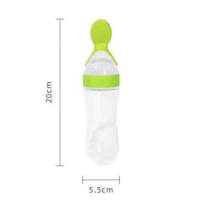 Ergonomic squeeze feeder bottle with integrated silicone spoon for easy baby meal dispensing