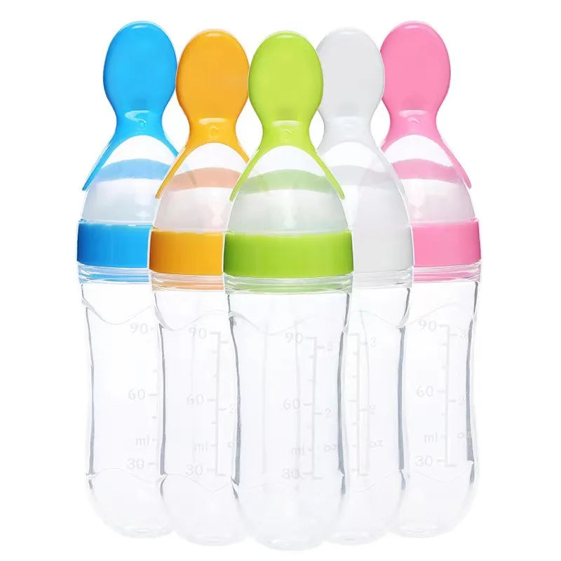 Newborn care essential: versatile baby bottle with a soft silicone training spoon attachment