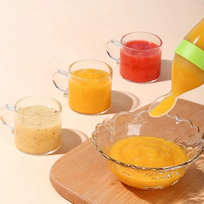 Durable silicone spoon and squeeze feeder combo, ideal for baby's first solid foods