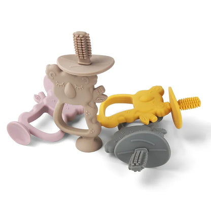 BPA-free infant teething toy that doubles as a training toothbrush for oral care