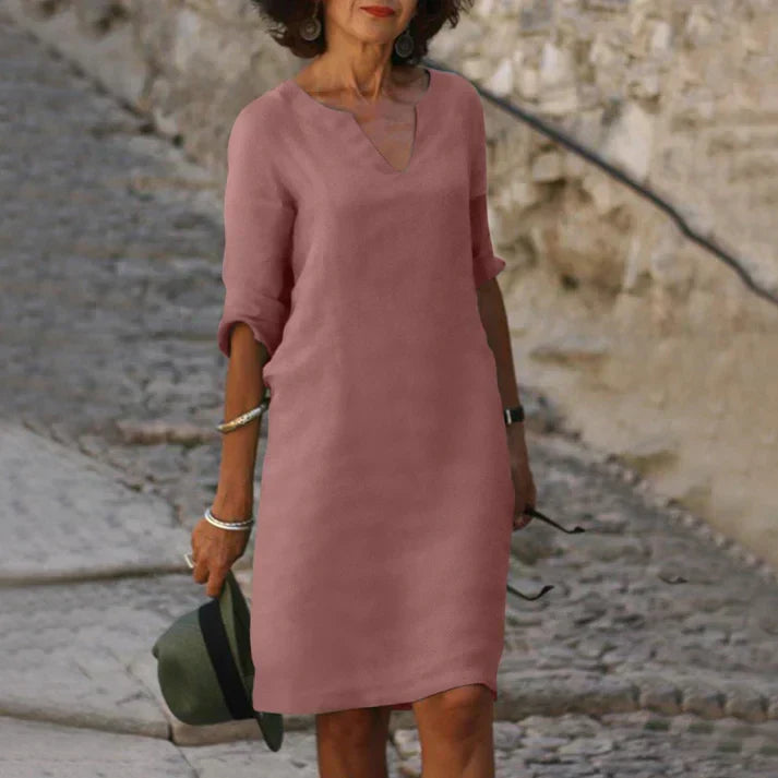 Breezy V-neck midi dress for women, perfect for summer comfort and casual elegance.
