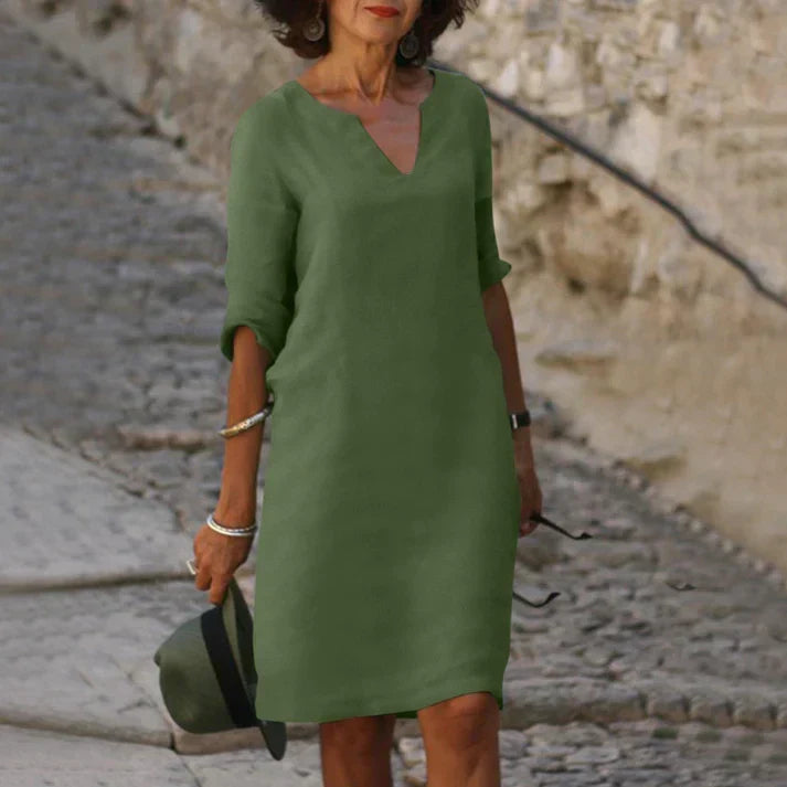 Versatile women's clothing: a breezy V-neck midi dress for casual or semi-dressy summer looks.