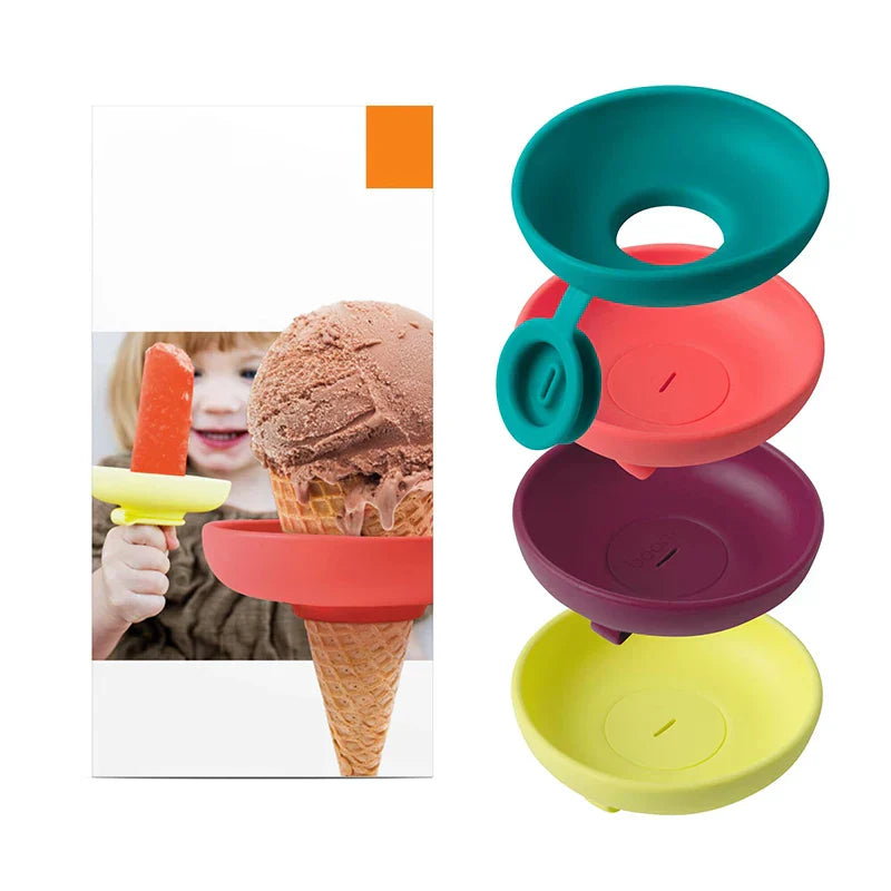 Bright pink silicone ice cream holder designed for kids, preventing drips and mess during snack time fun