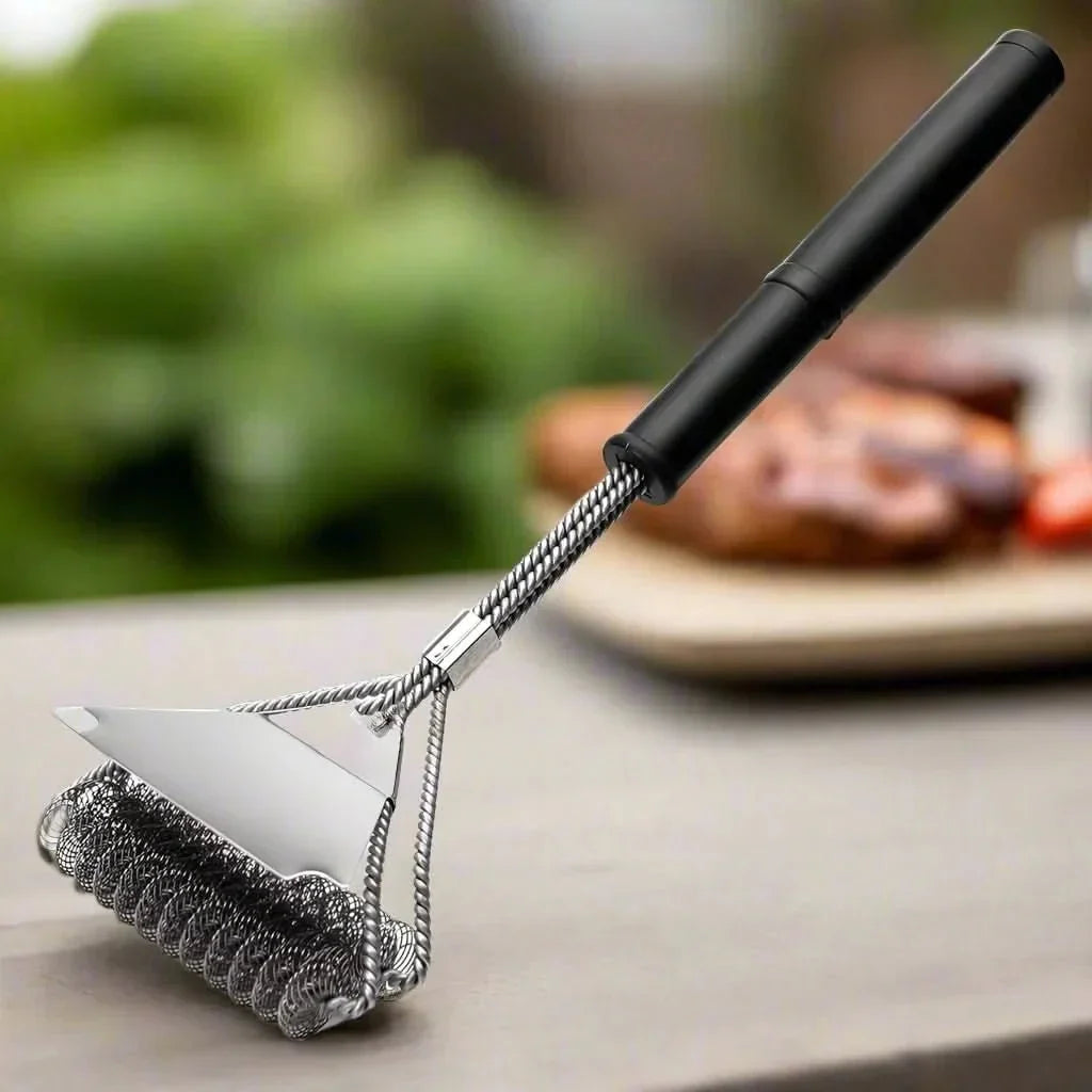 Essential outdoor cooking tool: bristle-free stainless steel BBQ grill brush for quick, safe cleaning.