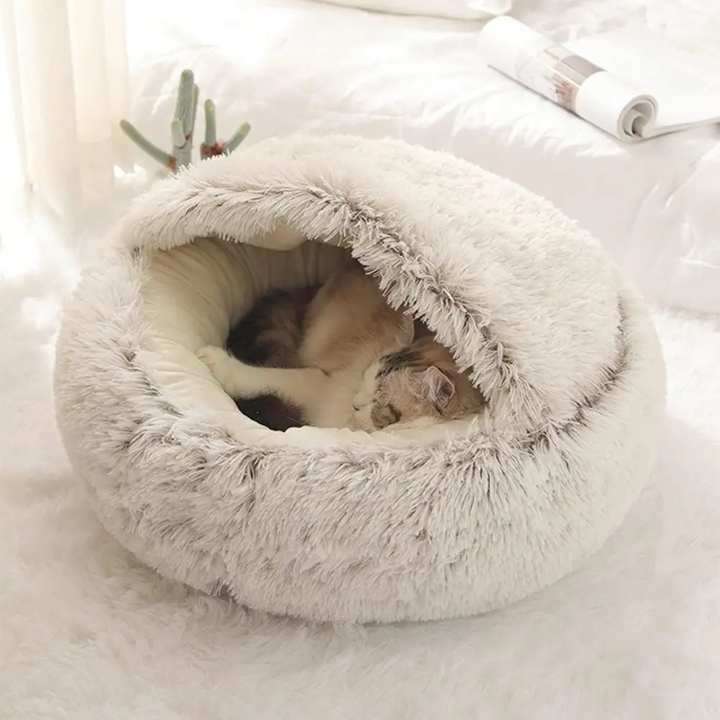 Durable, washable calming dog bed. The cozy cave offers a comfortable haven for deep sleep & pet relaxation.