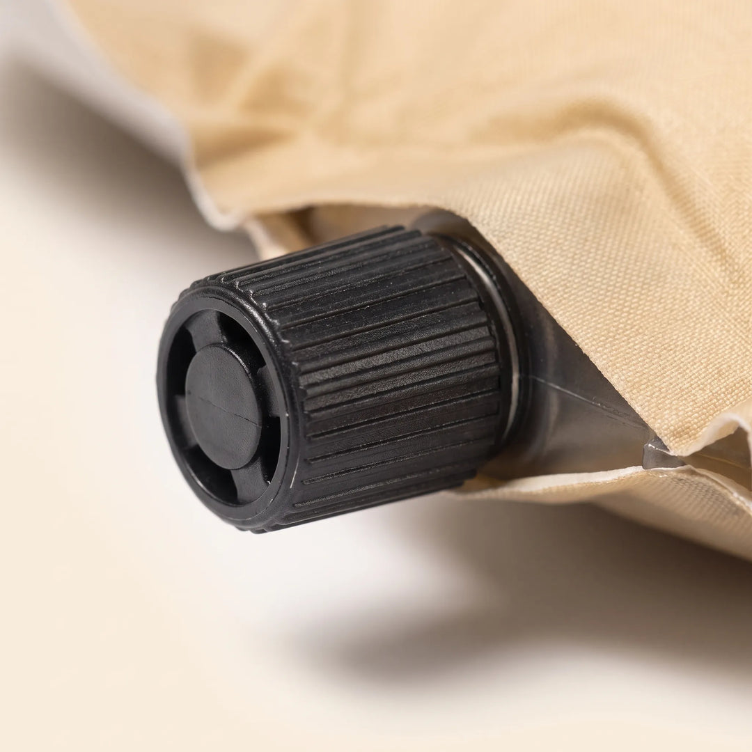 Durable self-inflating sleeping pad for camping, hiking, and outdoor recreation, ensures camp comfort.
