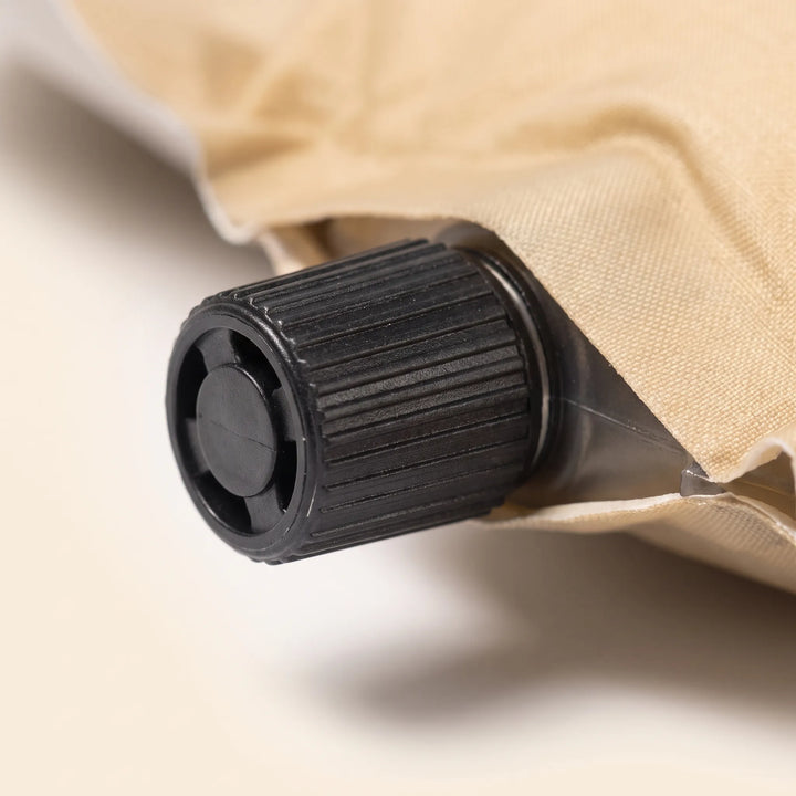 Durable self-inflating sleeping pad for camping, hiking, and outdoor recreation, ensures camp comfort.