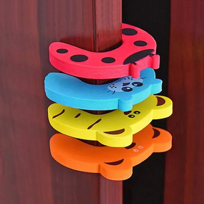 Cartoon animal baby safety door stopper blocking door, preventing finger pinch in nursery.