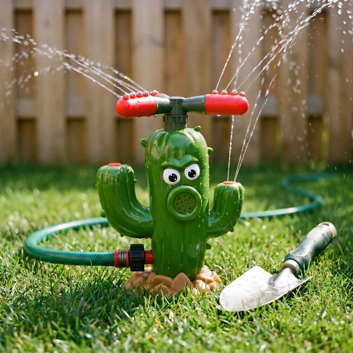 Friendly green cartoon cactus sprinkler drenching happy kids with water in the summer backyard.