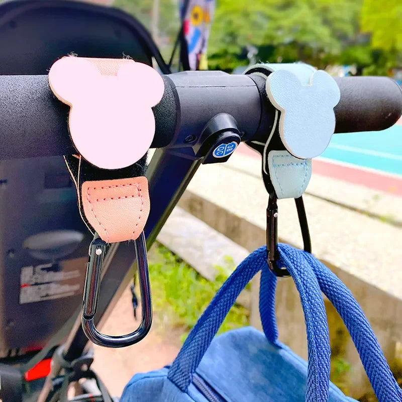 Rotatable cartoon PU leather stroller hook, part of 'baby accessories' for convenient bag attachment