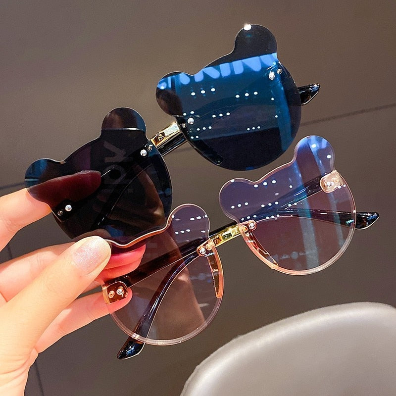 Baby accessories: UV protection sunglasses featuring cute cartoon characters for kids