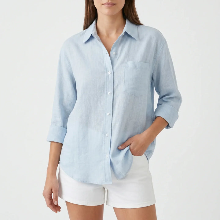 Elegant women's long-sleeve button-up blouse, ideal workwear & smart casual top with collar.