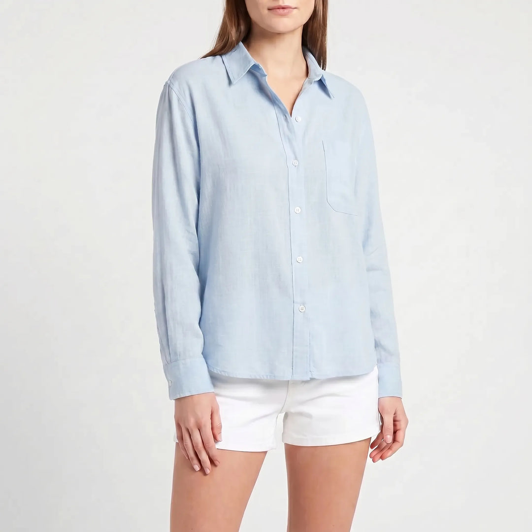 Fashionable women's long-sleeved button-up blouse, essential casual wear & everyday apparel.