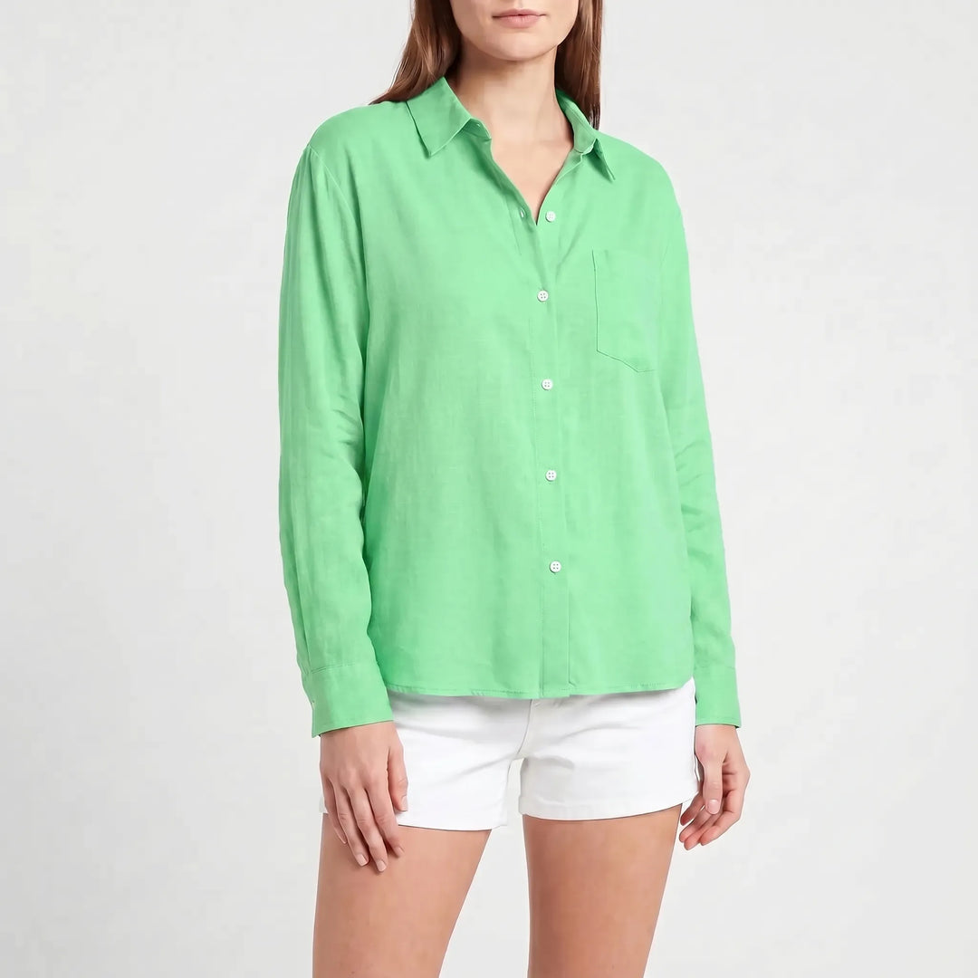 Versatile women's long-sleeved button-up blouse, a perfect casual top for work or everyday fashion.