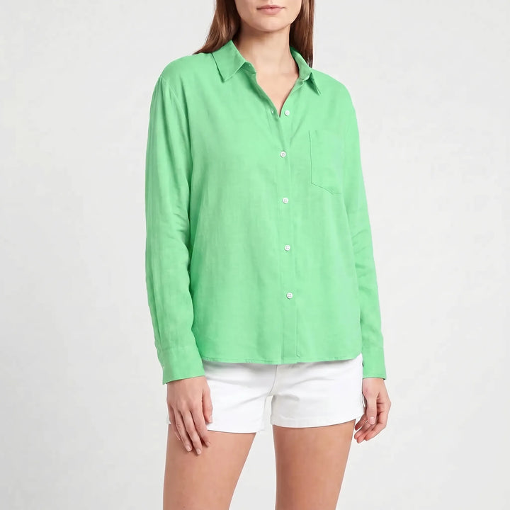 Versatile women's long-sleeved button-up blouse, a perfect casual top for work or everyday fashion.