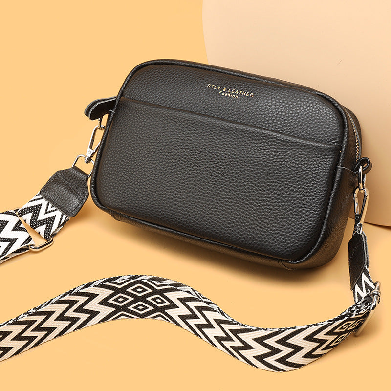 Modern women's chic crossbody handbag, a must-have fashion accessory for contemporary style.