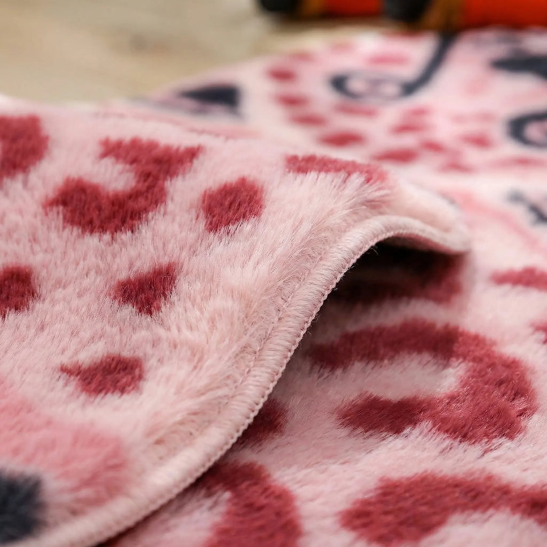 Modern leopard print shaped accent rug. Cozy & plush floor decor with whimsical waves, perfect for chic pink home decor.