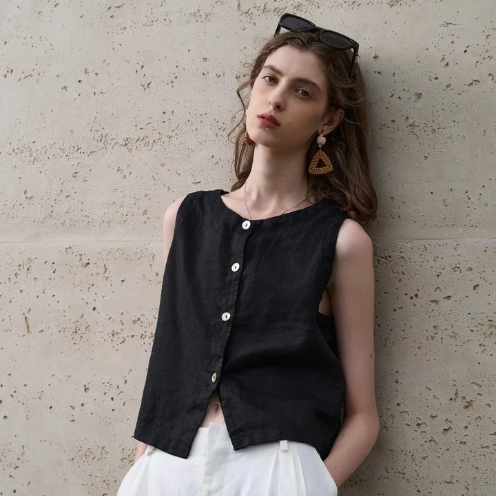 Comfortable white women's asymmetric crop top, sleeveless & chic. Ideal for summer casual or everyday wear.