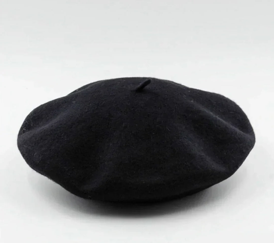 Textured knit women's beret, a chic and warm winter hat, comfortable headwear accessory.