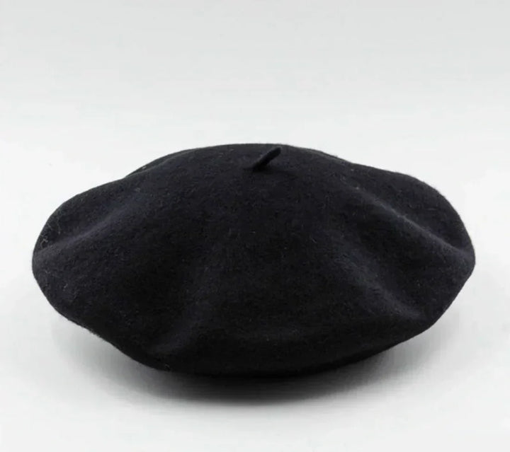 Textured knit women's beret, a chic and warm winter hat, comfortable headwear accessory.