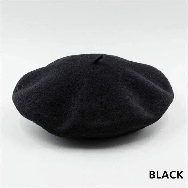 Stylish black beret hat for women, elegant winter headwear and warm fashion accessory.