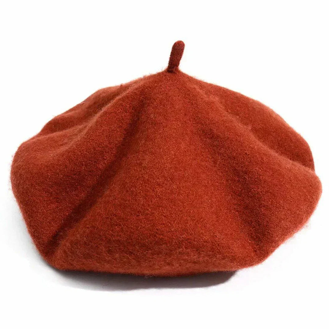 Fashionable grey beret hat for women, soft and warm winter headwear accessory.