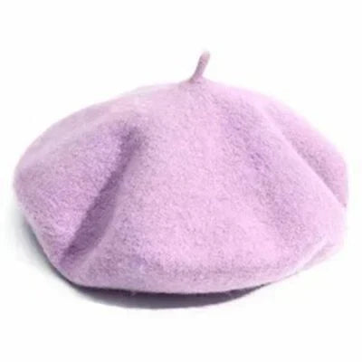 Mustard yellow women's beret hat, vibrant winter headwear, a stylish and warm accessory.