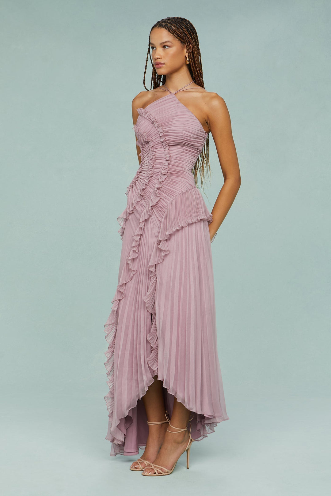 Back view of chic ruffle halter maxi dress, showing elegant design. Ideal women's formal wear for wedding guests.