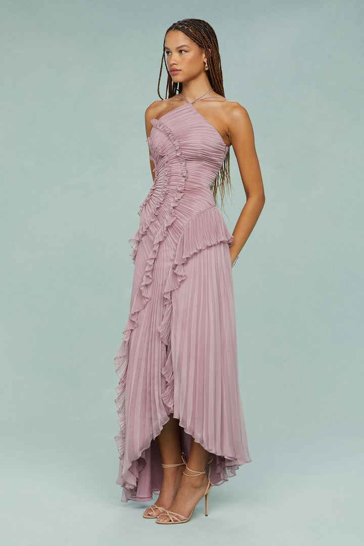 Back view of chic ruffle halter maxi dress, showing elegant design. Ideal women's formal wear for wedding guests.