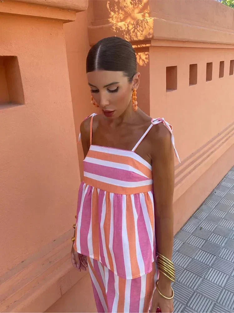 Versatile women's striped wide leg set, a fashionable two-piece for wedding guests, resort, or vacation wear.