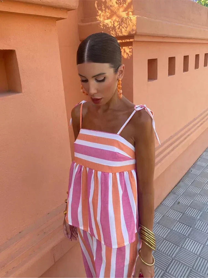 Versatile women's striped wide leg set, a fashionable two-piece for wedding guests, resort, or vacation wear.