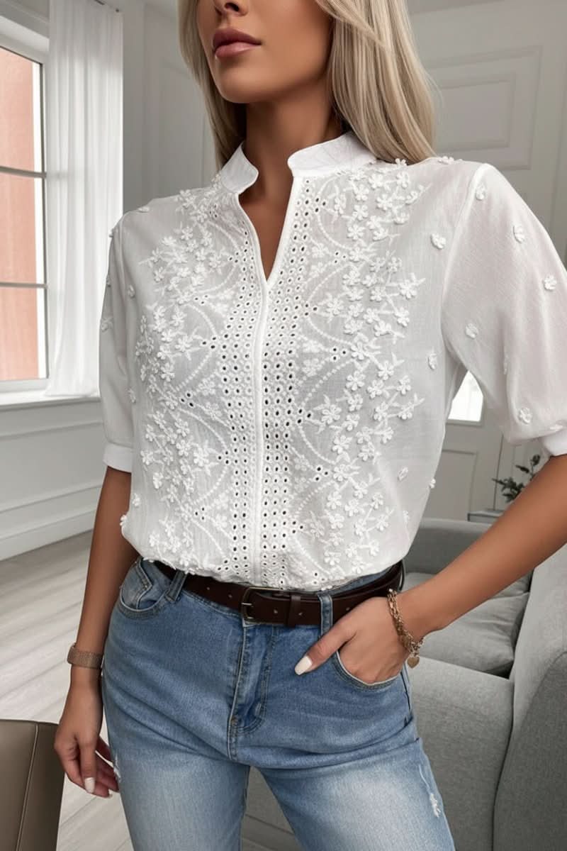 Versatile short-sleeve V-neck women's blouse. Elegant yet comfortable, suitable for office, casual, or evening looks.