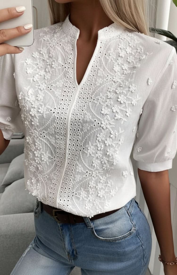 Stylish V-neck women's short-sleeve top. Elegant, chic, and comfortable, perfect for summer casual or office wear.