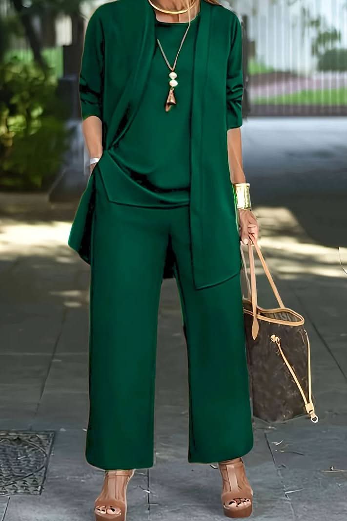 Chic women's 3-piece summer lounge set. Features stylish top, flowy pants & lightweight coverup for an elegant casual outfit.