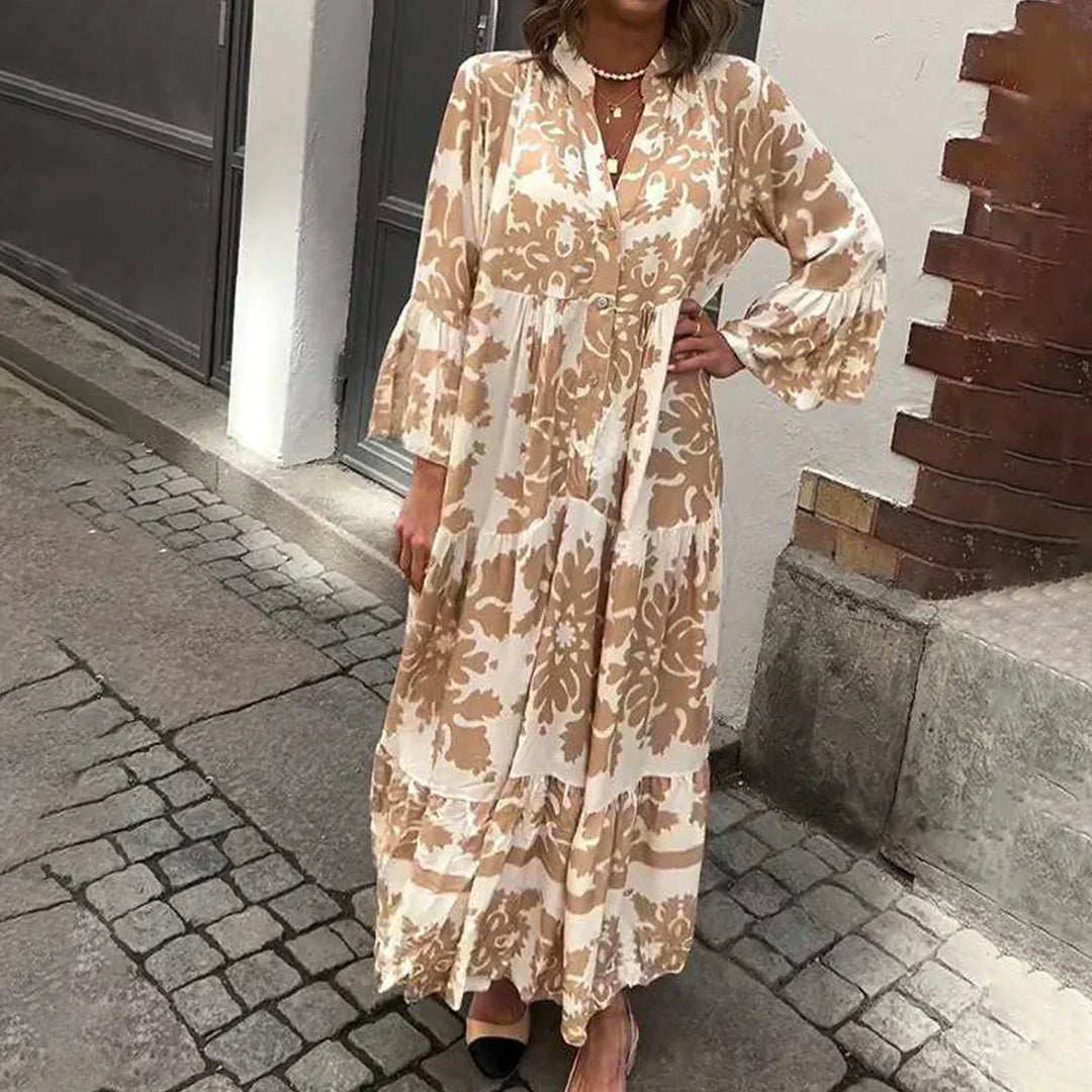 Chic women's baroque print maxi dress with elegant lantern sleeves, V-neck, and tiered flowy skirt, perfect for summer.