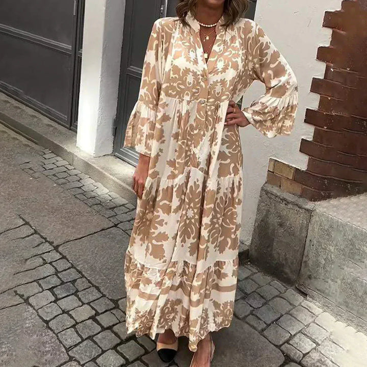 Chic women's baroque print maxi dress with elegant lantern sleeves, V-neck, and tiered flowy skirt, perfect for summer.
