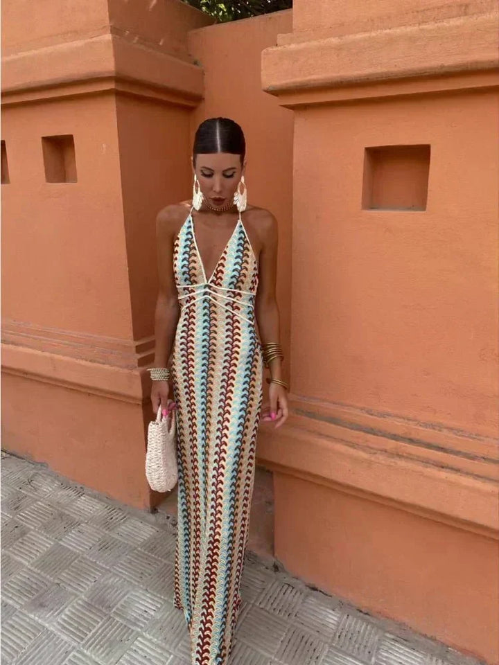 Chic women's boho printed maxi wedding guest dress with elegant flowing fabric, perfect for summer events.