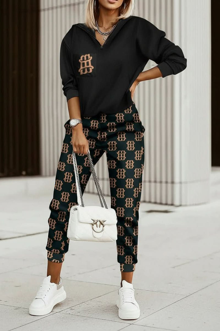 Modern women's two-piece activewear tracksuit, offering chic style & comfort for a fashionable casual look.